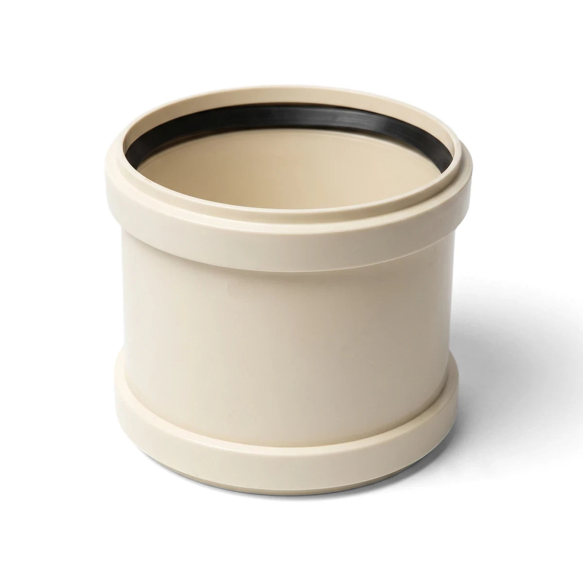 Beige plastic Kimberley socket rubber ring plumbing fitting, cylindrical shape with a black interior seal, on a white