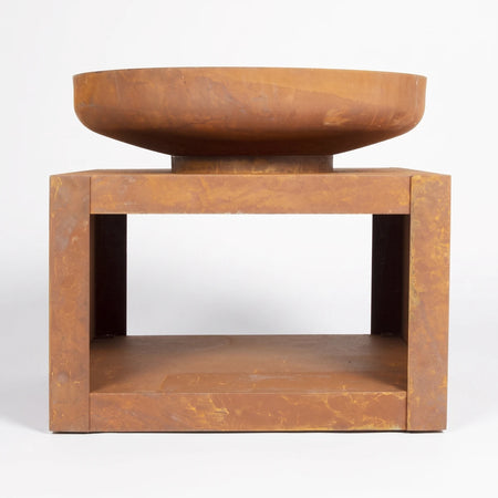 Kuda Oxidised Outdoor Fire Pit - Medium, made of rusted metal, featuring a square base and round bowl design.