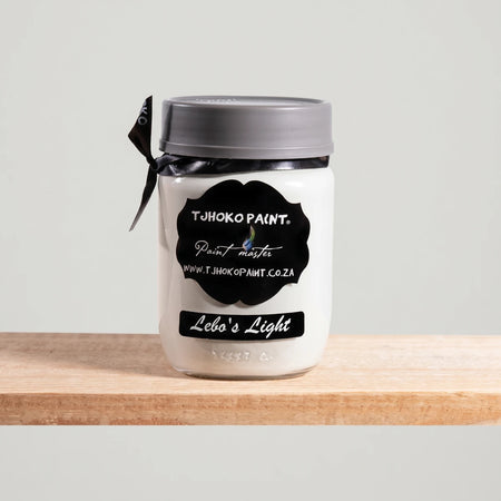 Lebo's Light 250ml Chalk Paint in a white jar with a black label and a grey lid, displayed on a wooden shelf.