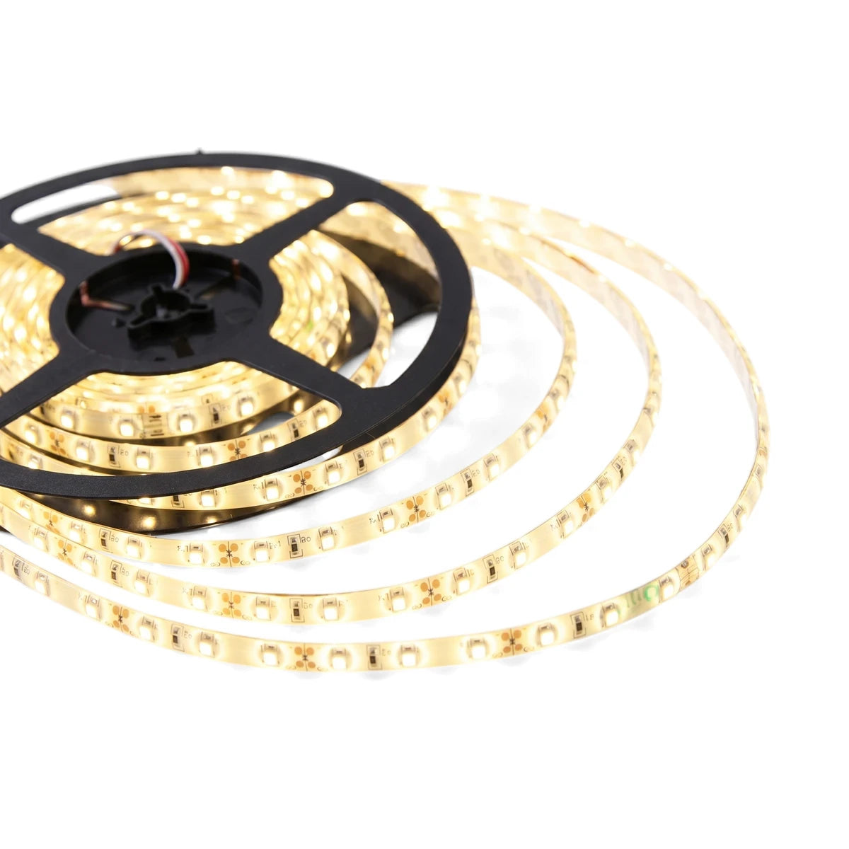 Close-up of a 5M 8mm warm white LED strip light, coiled on a black reel, brightly illuminated for ambient lighting.