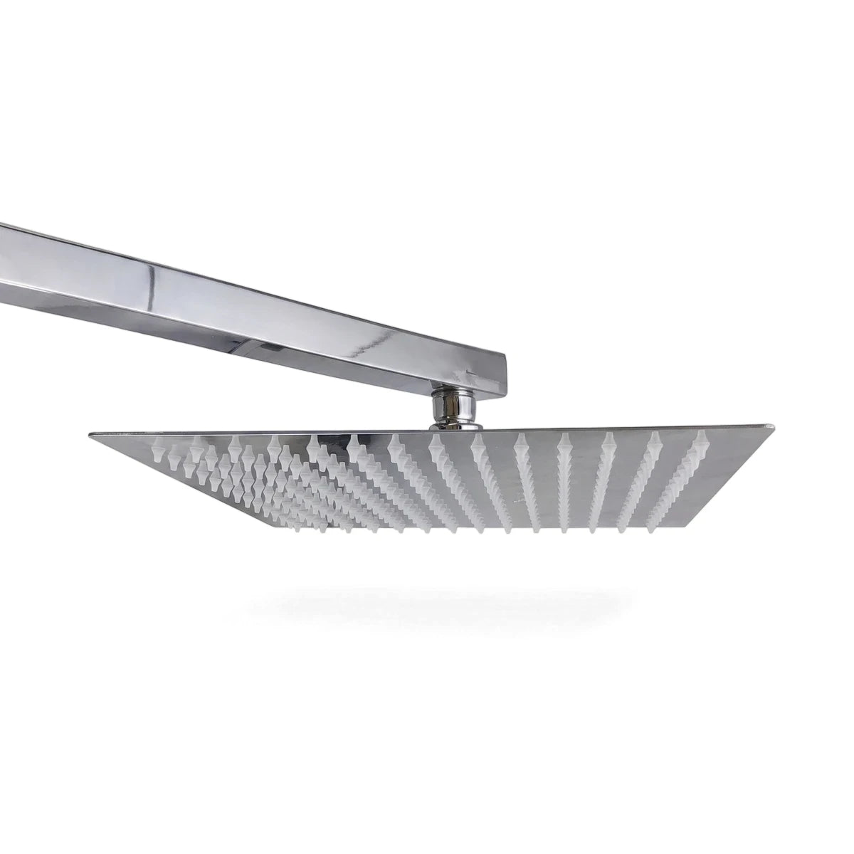 Close-up of a square chrome Lluvia shower head with white nozzles and a matching square arm, photographed from a slightly