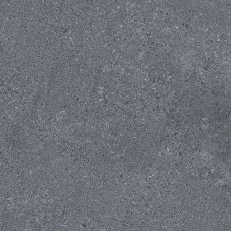 Manna Charcoal dark gray speckled tile surface, a textured material for flooring or walls.