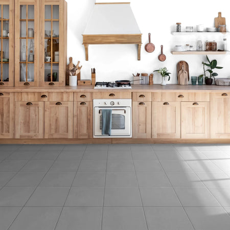 Marachino Cotta 33X30Cm 1.80Sqm Tiles in a bright kitchen with light wood cabinets and white appliances.
