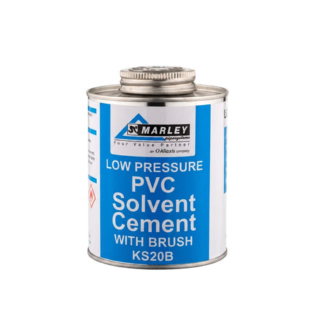 Marley PVC Solvent Cement tin with brush, 500ml capacity, blue and white label, shown from an elevated angle.