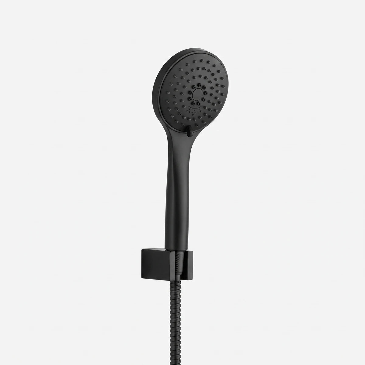 Matte black hand shower featuring a round head, cylindrical handle, square wall mount, and a coiled hose.