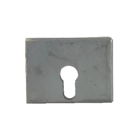 A metallic grey rectangular escutcheon plate or strike plate with a keyhole cutout in the center for a cylinder lock.