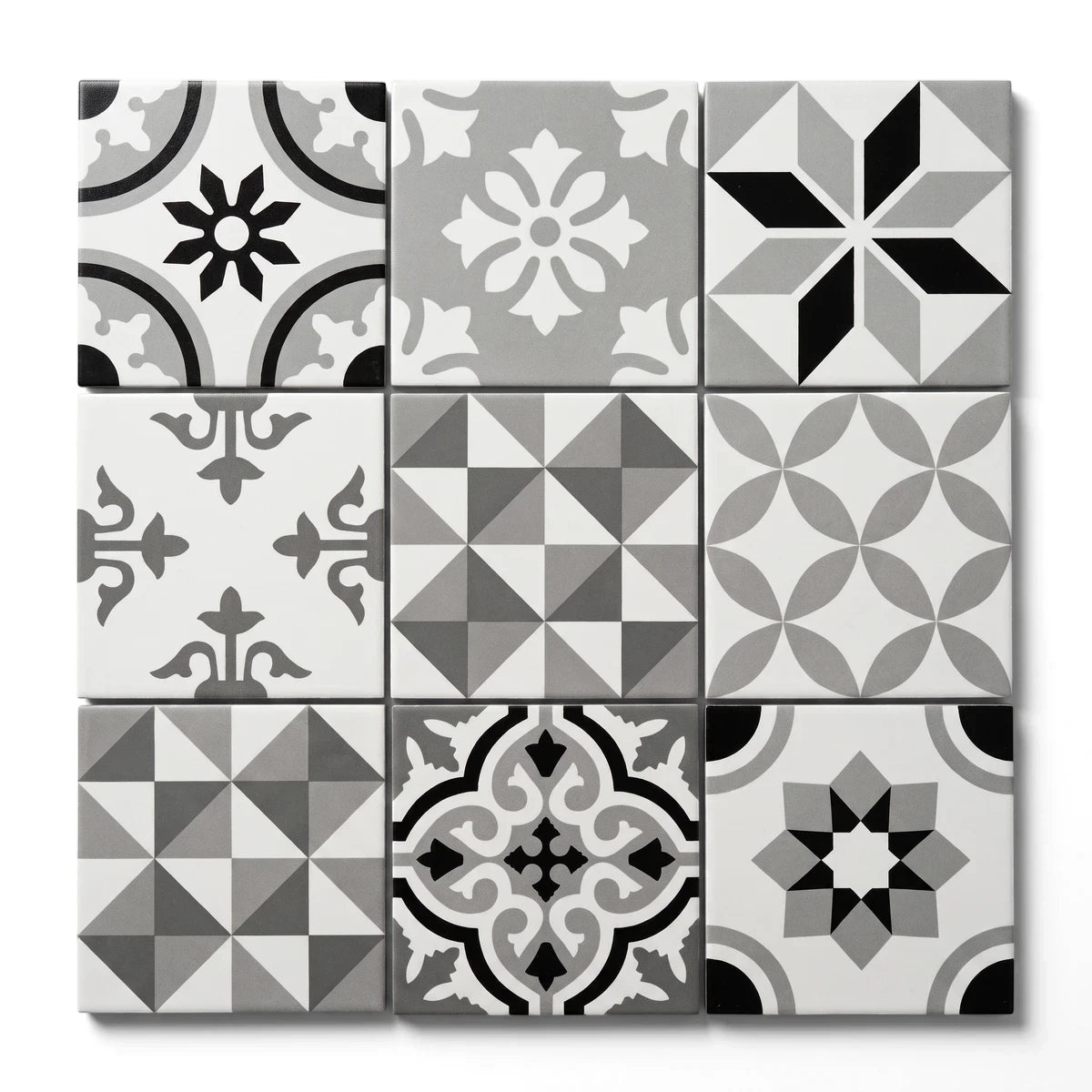 A 3x3 grid of square monochrome decorative tiles, 200x200mm each, featuring unique black, white, and gray geometric and