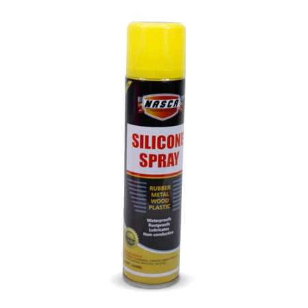 Black NASCA Silicone Spray can with a yellow cap, suitable for rubber, metal, wood, and plastic, shown standing upright.