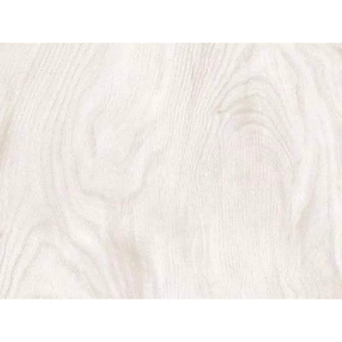 Close-up of Northwood Natural tiles, showcasing their white wood-grain texture and subtle variations.