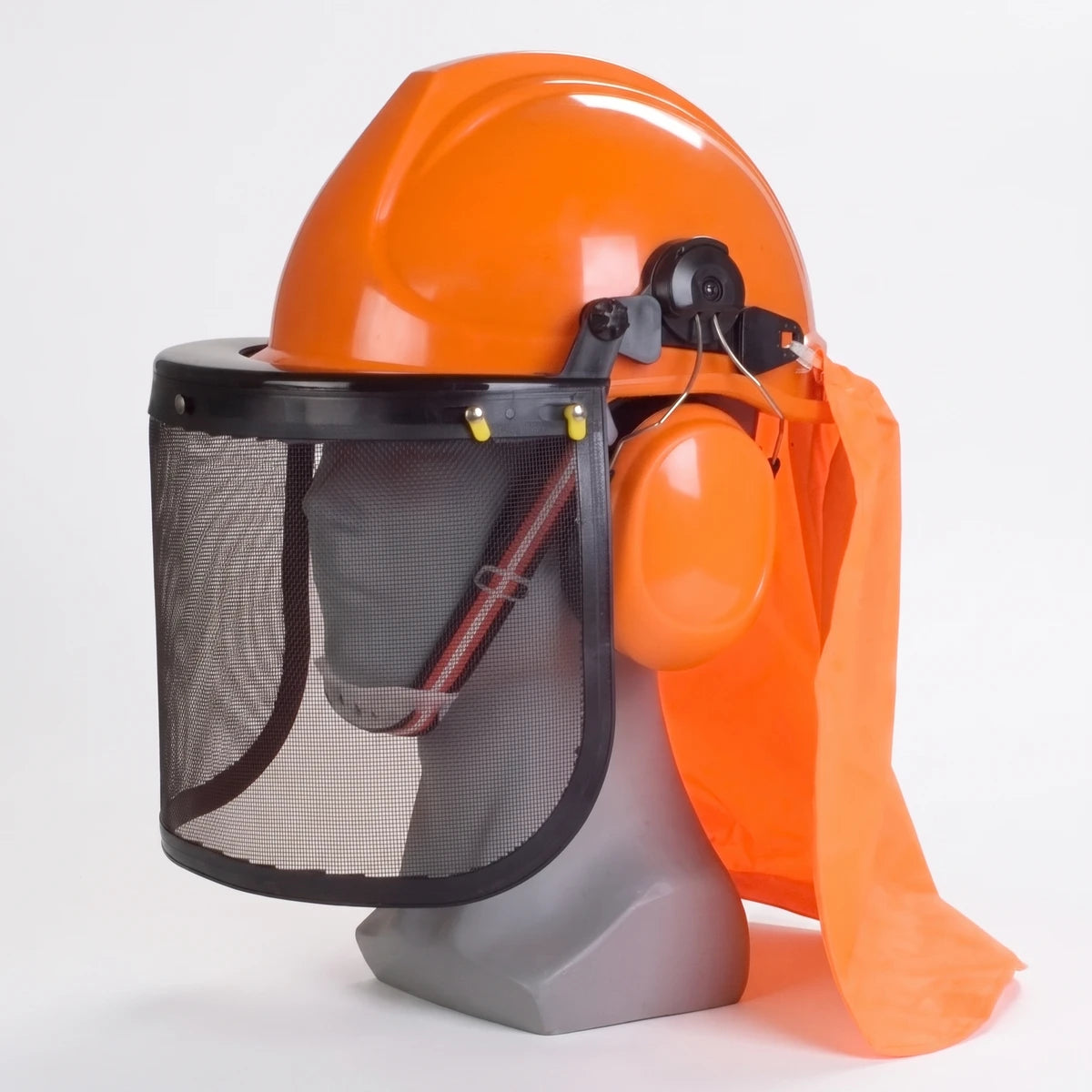 Orange safety helmet with attached ear muffs and a black mesh face shield, displayed on a grey mannequin head.
