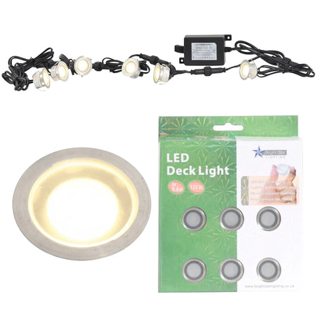 Outdoor white LED deck light set made of stainless steel and polycarbonate, including power supply and packaging.