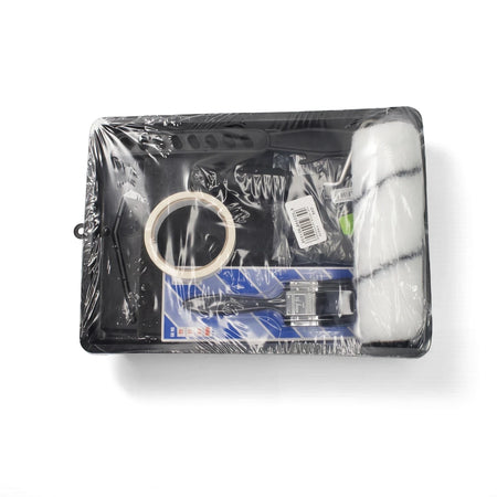 Paint Roller Set Combo with black tray, white paint roller, masking tape, and various painting tools packaged in clear