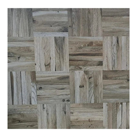 Ash wood parquet tile in a 50x50cm size, featuring a distinctive patterned arrangement of greyish-brown rectangular pieces.