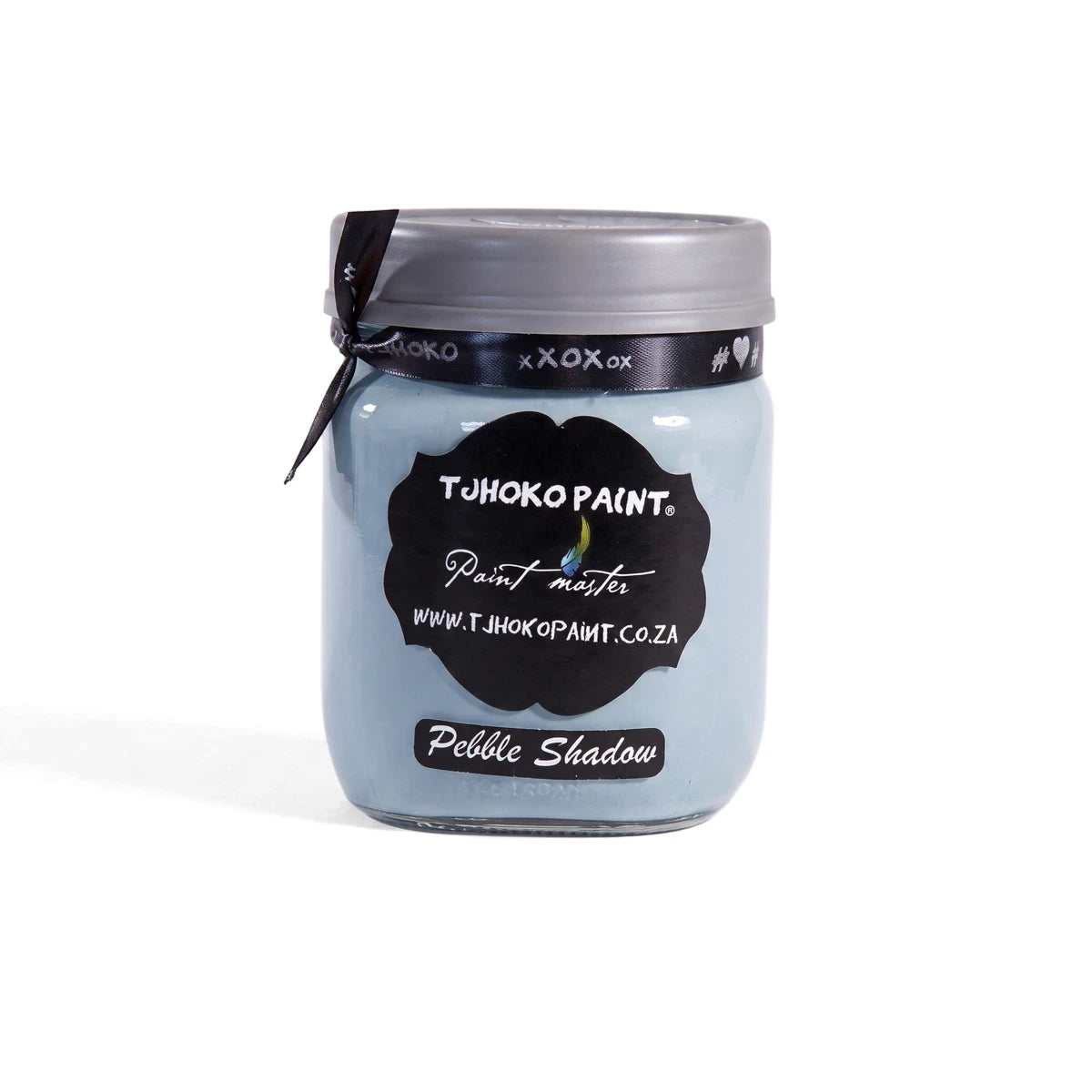 Pebble Shadow 500ml Chalk Paint in a light blue glass jar with a black label, displayed on a wooden shelf.