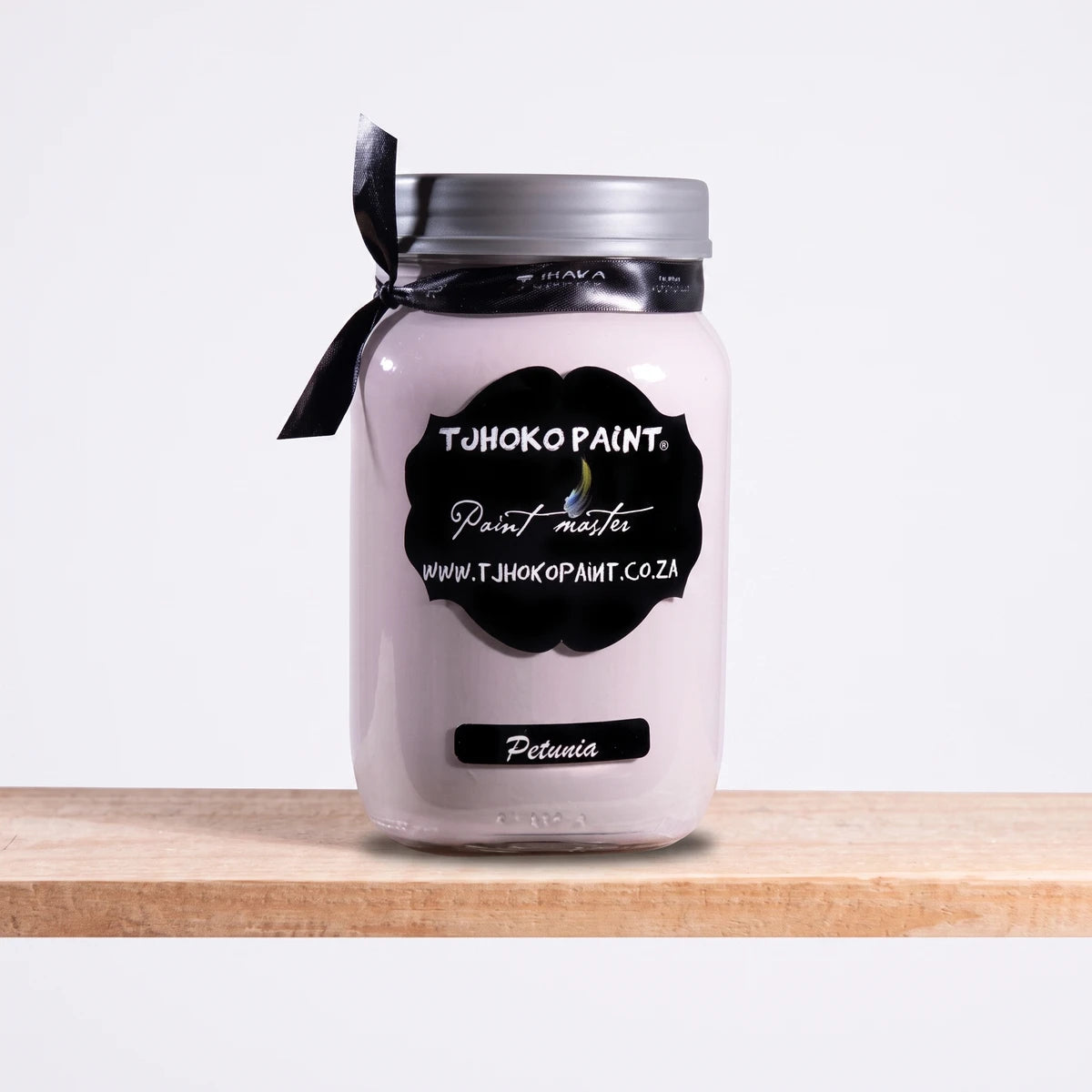 Petunia 1L Chalk Paint in a clear jar with silver lid, pastel lavender paint shown in front view.