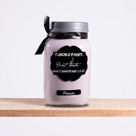 Petunia 1L Chalk Paint in a clear jar with silver lid, pastel lavender paint shown in front view.
