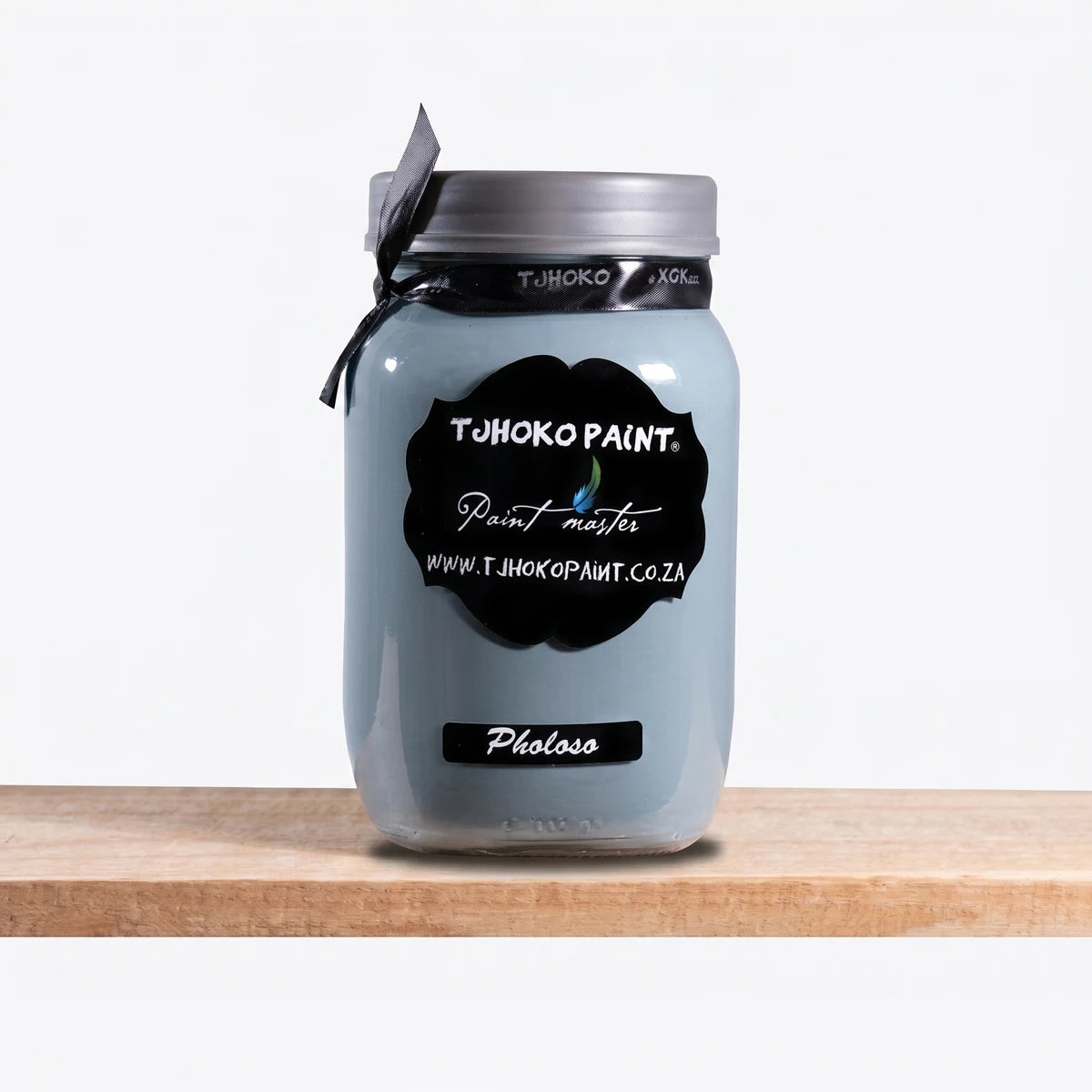 Pholoso 500ml Tjohoko Chalk Paint in a light blue-grey glass mason jar with a black label and ribbon.