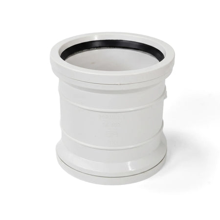 A white PVC Soil/Vent Kimberley Socket, a durable cylindrical pipe fitting with a visible black rubber seal, stands