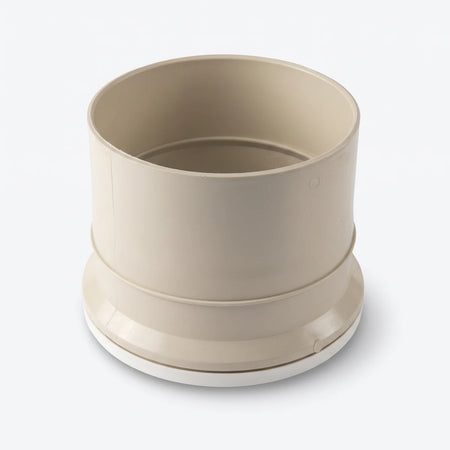 Beige PVC underground single socket pipe fitting shown at an angle on a white background.