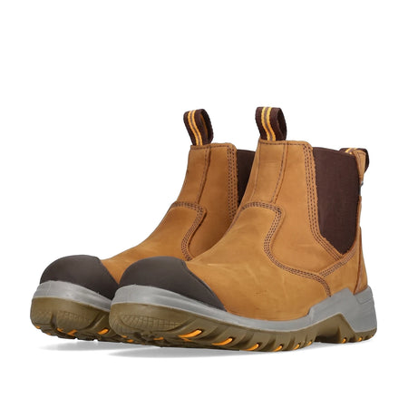 Pair of tan Rebel Crazy Horse safety boots with dark grey toe caps, grey midsoles, and orange-accented outsoles, designed