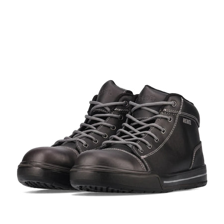 Pair of black Rebel Lo-Top safety shoes, featuring a mid-top design with white contrast stitching and gray laces, viewed