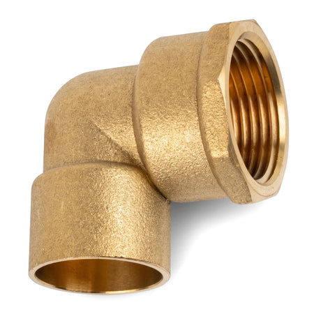 A brass reducing CXFI elbow fitting, seen at a slight angle, showcasing its 90-degree bend and threaded female end.