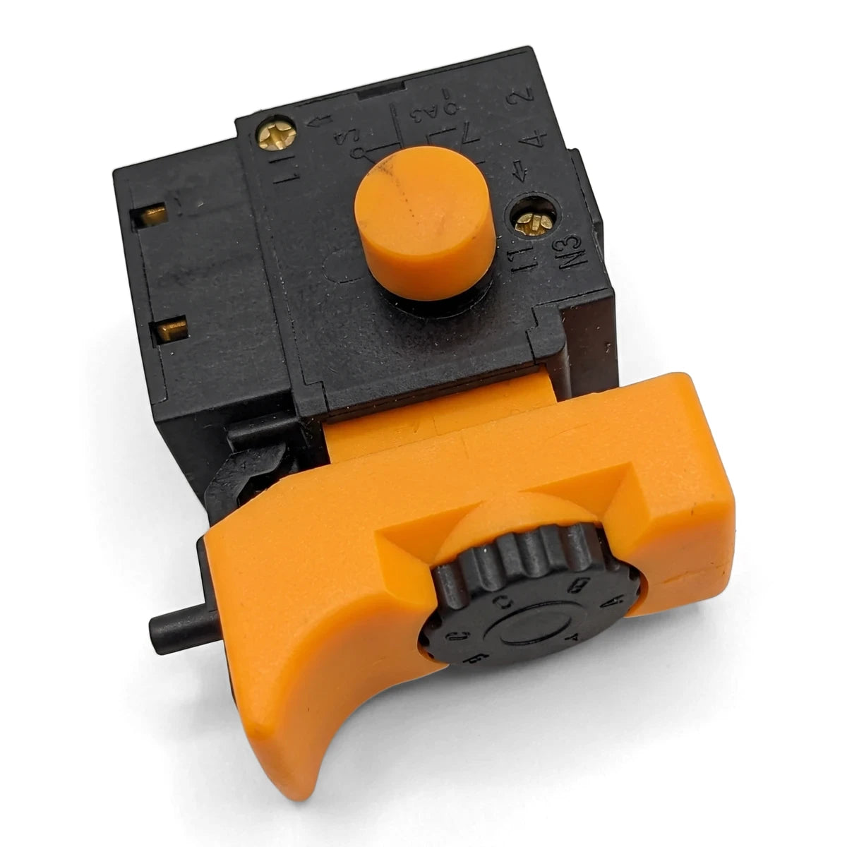 Orange and black replacement switch for an electric drill, shown from a top-down angle, suitable for power tool repair.
