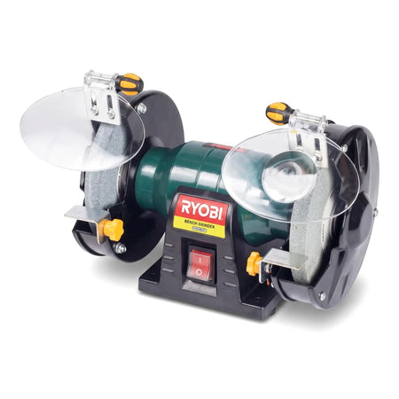 Green and black Ryobi bench grinder power tool for sharpening and grinding, shown from a slightly elevated front-left angle.