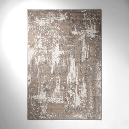 Salamanca Rug Beige, featuring an abstract distressed pattern in beige, brown, and white, displayed in a rectangular shape.