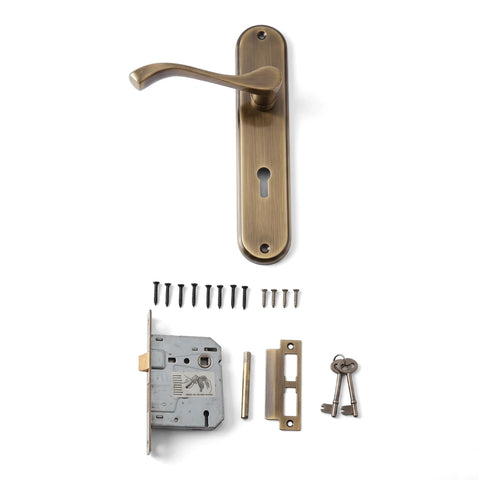 Samson Lset 3L Sabs 8 Nicole A/Br Lockset with antique brass handle, keyhole plate, internal mechanism, screws, and keys.