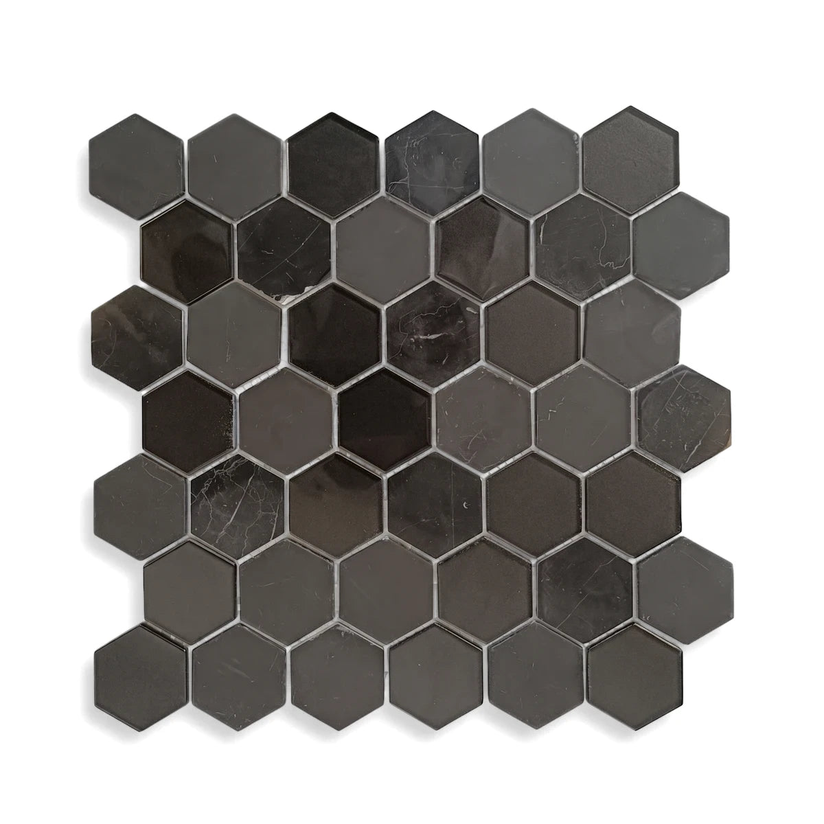 Shadow Medium Hexagon Mosaic Tile, featuring a mix of dark gray and black hexagons with both solid and marble textures.