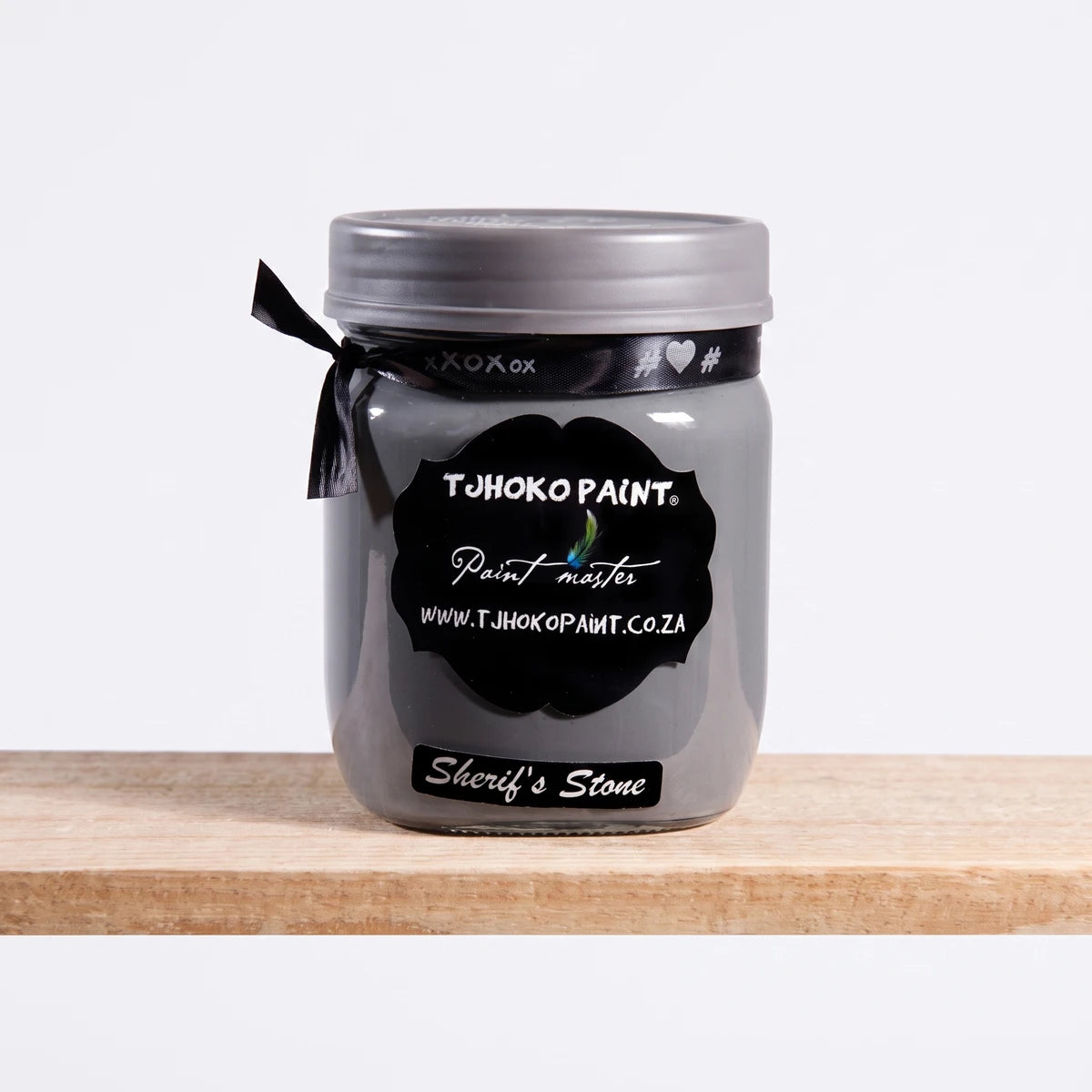 Sherif's Stone 500ml grey chalk paint jar with a black label and ribbon, viewed from the front.
