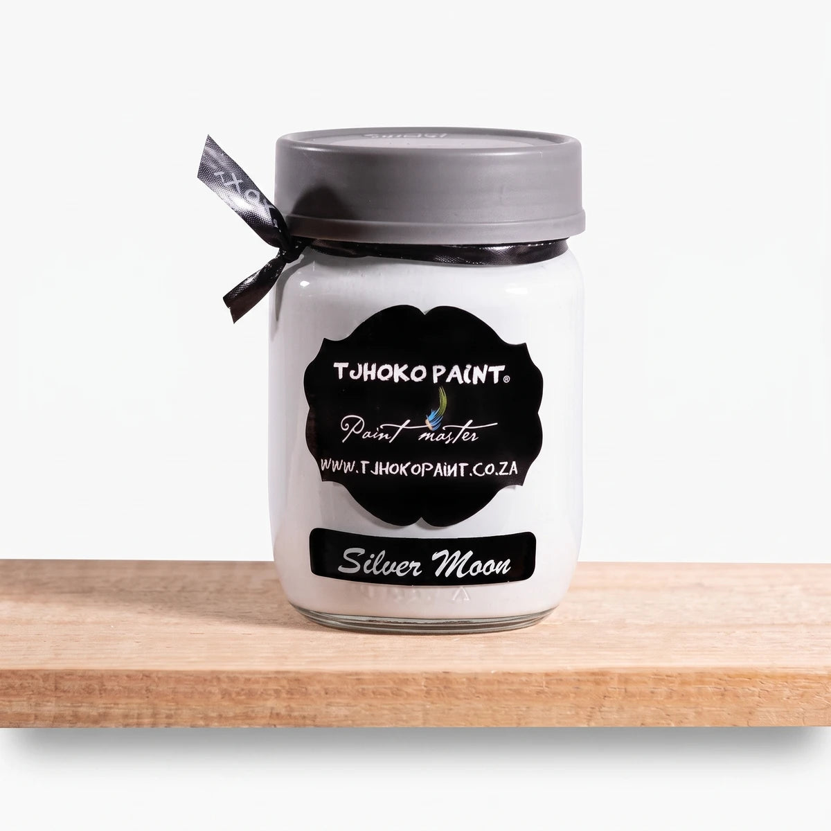 Silver Moon 250ml Chalk Paint in a white jar with a gray lid and black ribbon, displayed on a wooden surface.