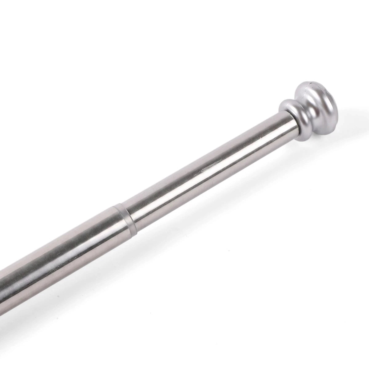 Close-up of a silver telescoping shower curtain rod with a decorative finial on a plain background, showing its brushed
