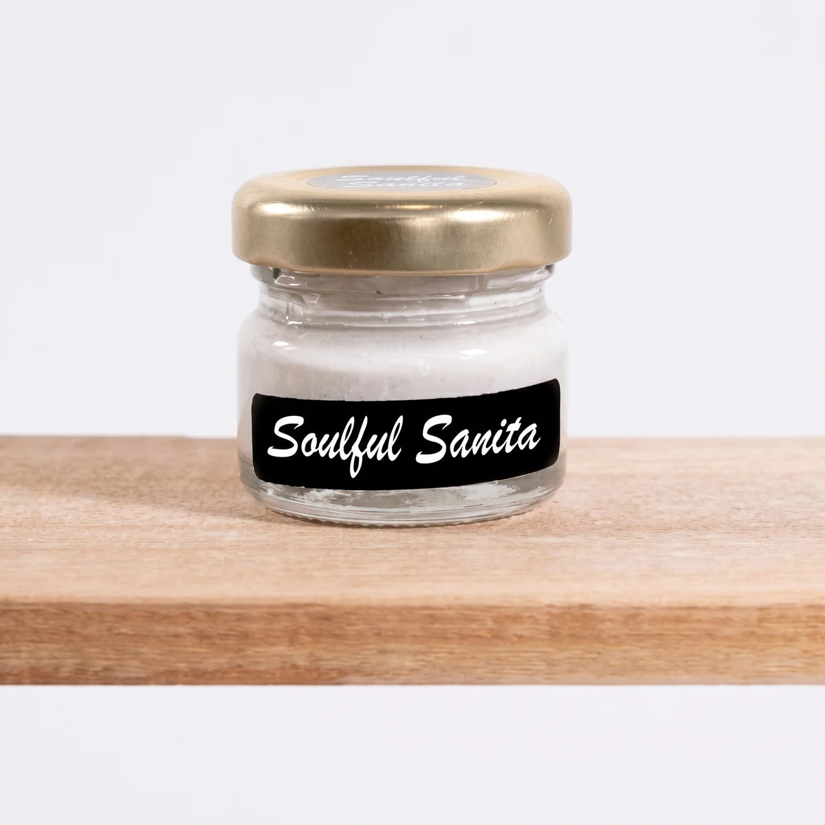 Soulful Sanita (Colour1) 25ml white paint in a small glass jar with a gold lid and black label.
