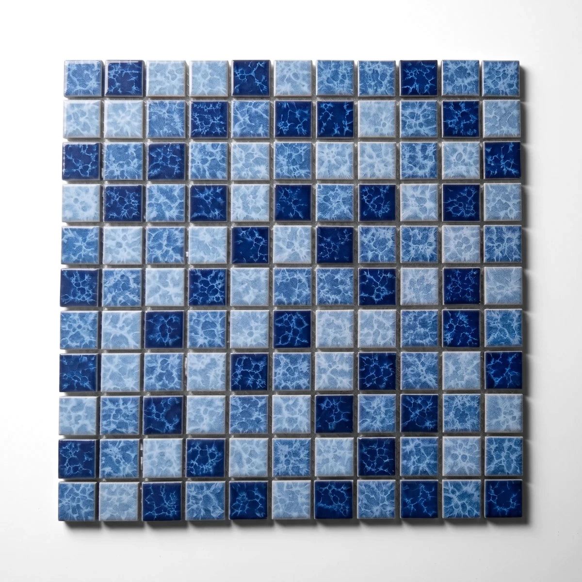 Splash Blue Square Mosaic Tile, 23mm, featuring a patterned design in various shades of blue with a mottled texture and