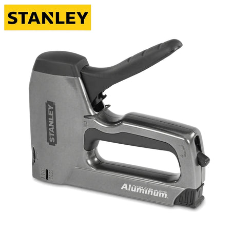 Stanley Hd 0-Tr250 staple gun, gray with a black handle, made of durable aluminum, shown from an angled perspective.