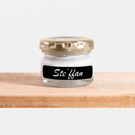Steffan 25ml white chalk paint in a small clear glass jar with a gold lid and a black label.