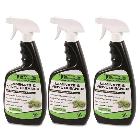 Three black spray bottles of Stone Shield Pure-Nature Laminate & Vinyl Cleaner with pine & eucalyptus scent, eco-friendly