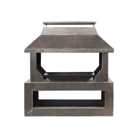 Dark Stonehurst Outdoor Fireplace, made of metal or stone, featuring a square base, open mid-section, and a pyramidal top.