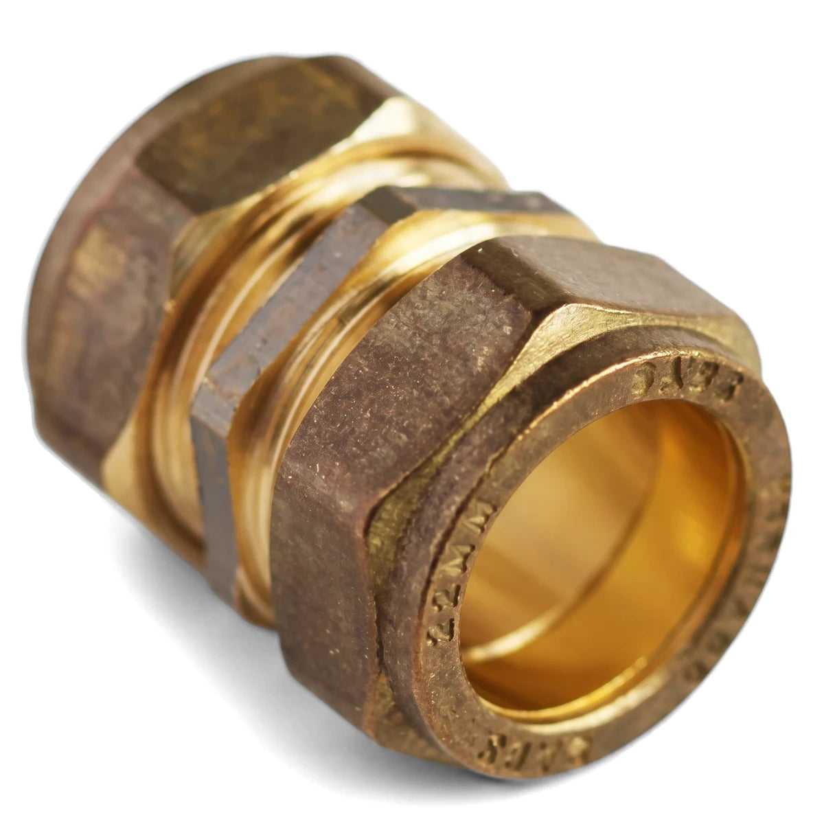 A close-up shot of a brass straight CXC compression coupler with hexagonal ends and visible 22mm marking, angled against a