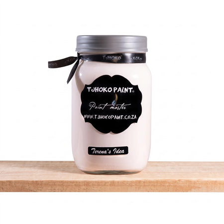 White Terena's Idea 1L Chalk Paint in a glass jar with a black label and silver lid, displayed on a wooden shelf.