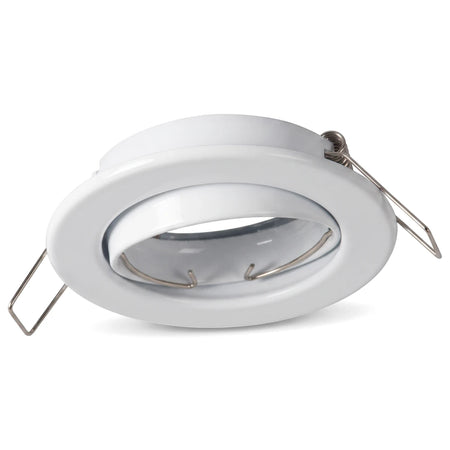 White tiltable pressed metal downlight fitting without a lampholder, viewed from an angle.