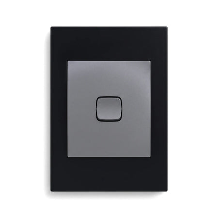 Titan 1L assembled switch cover plate in black and gray, featuring a single switch on a rectangular design.