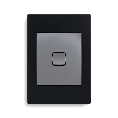 Titan 1L assembled switch cover plate in black and gray, featuring a single switch on a rectangular design.
