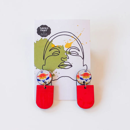 A pair of Tjhoko Earrings Range Paul's Abstract Art Earrings, featuring colorful abstract floral design tops and solid red