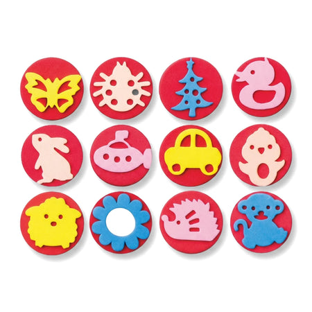 Tjhoko Jnr Junior Stamp Set of 12 featuring colorful foam shapes including animals, nature, and vehicles on red circular