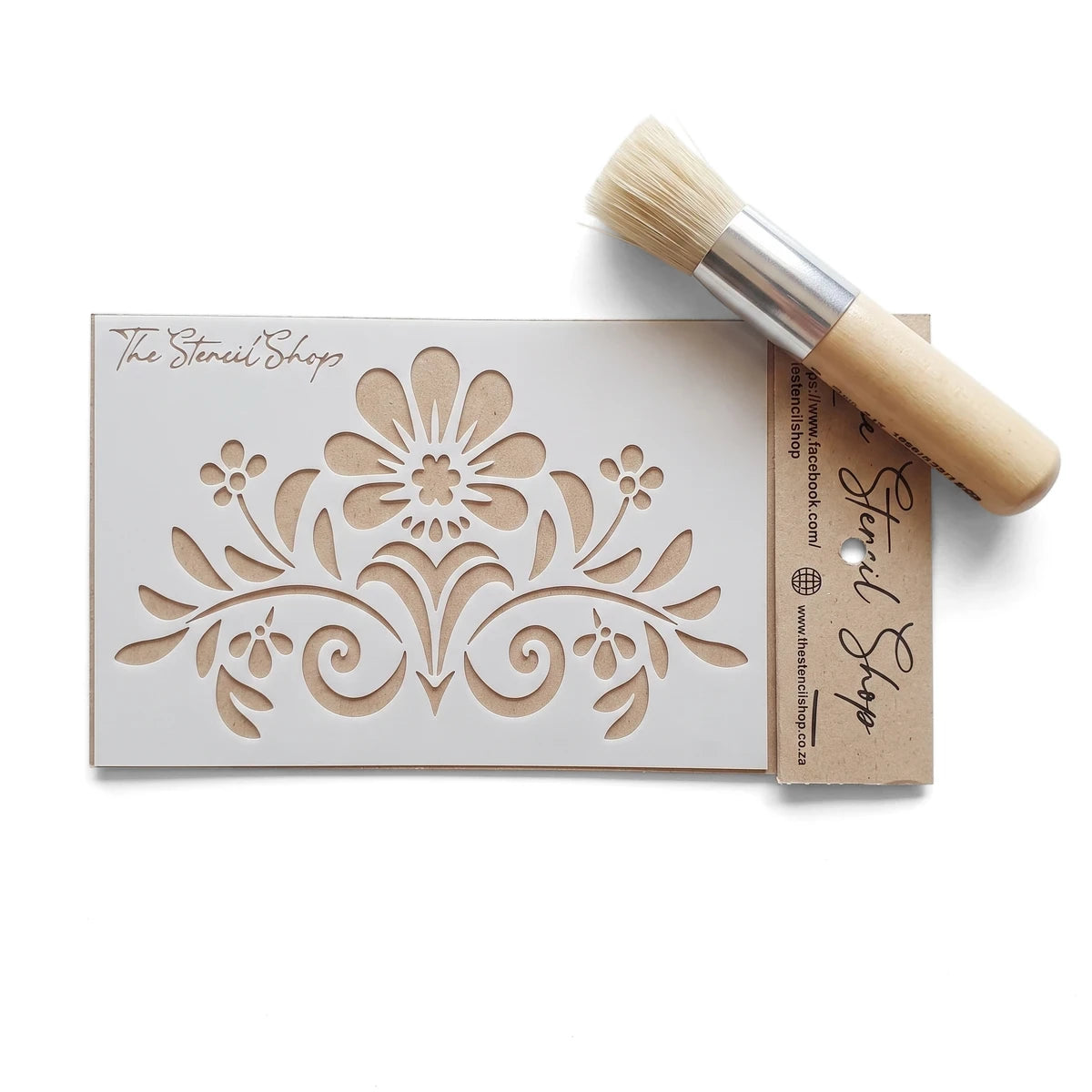 White Tjhoko Stenc A6-1 Proteas Paint Stencil with an intricate floral design, accompanied by a short-handled stencil brush.