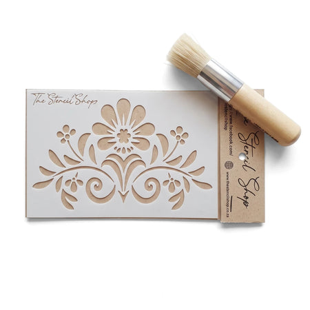 White Tjhoko Stenc A6-1 Proteas Paint Stencil with an intricate floral design, accompanied by a short-handled stencil brush.