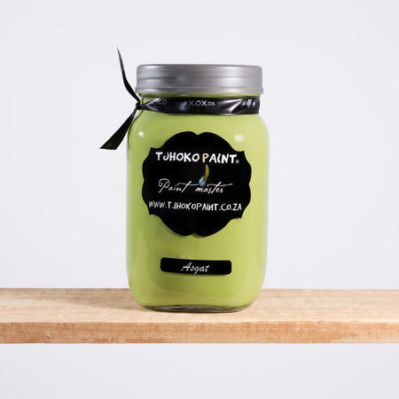 Tjohoko Paint 'Asgat' 1L chalk paint jar with a silver lid and black label, displayed on a wooden shelf.